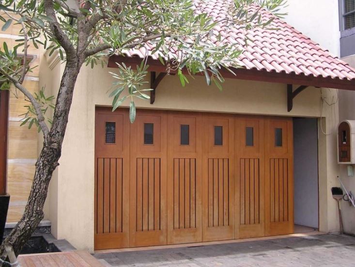 desain rumah minimalis dengan garasi pintu lipat