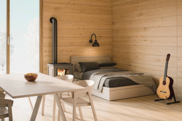 Desain kamar tidur dari triplek dengan meja makan.